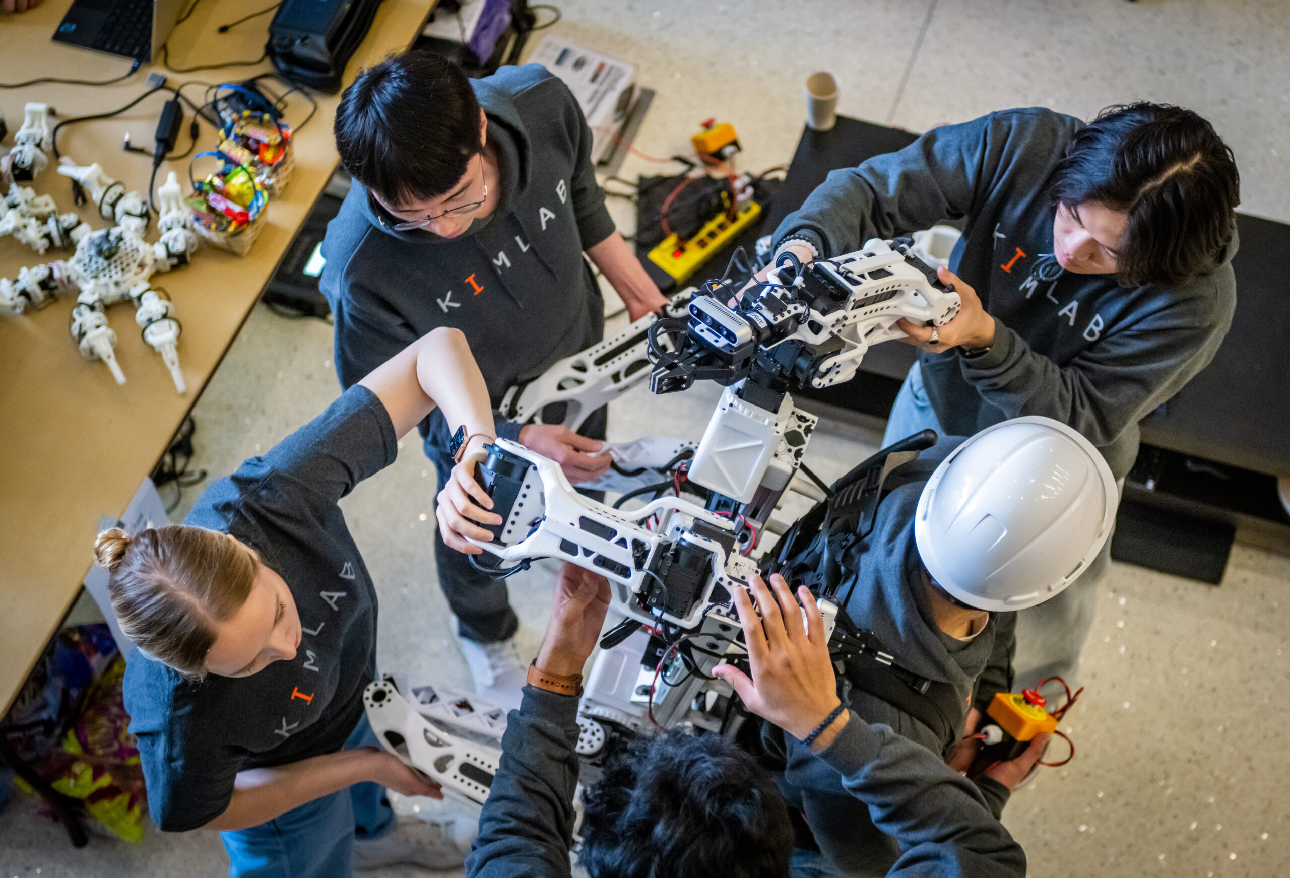 Student group working with a robot